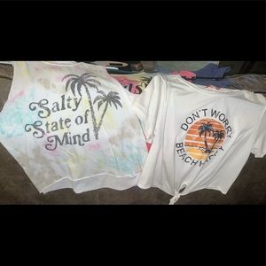 Lot of 4 beach themed shirts.